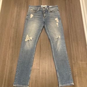 Like new tapered slim blue Jean.